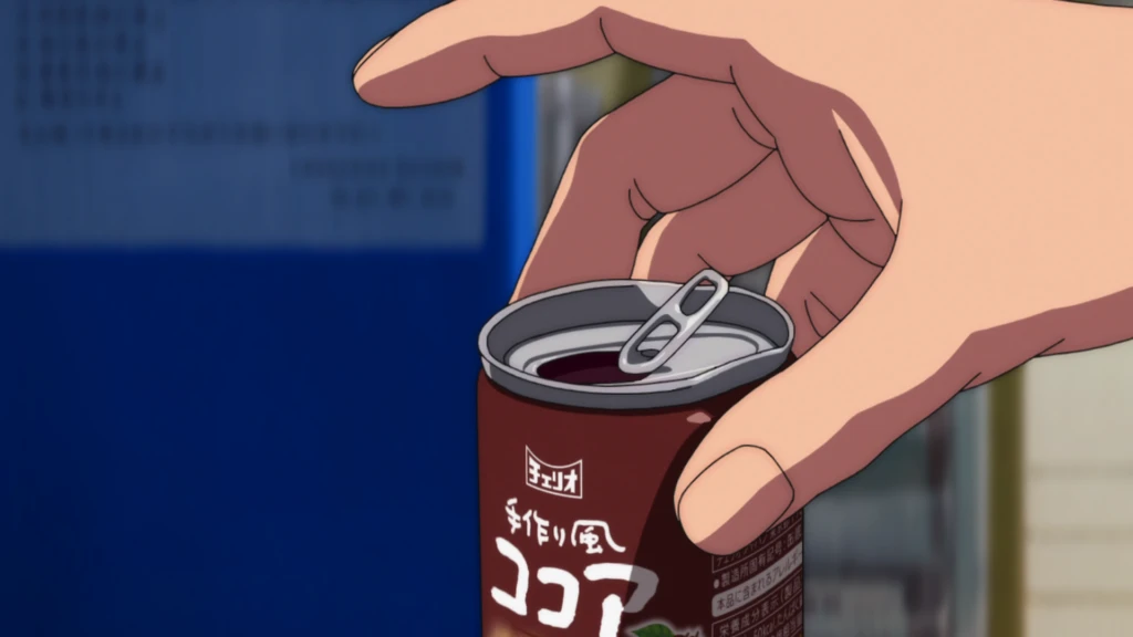 goodbye lara screenshot close-up of a hand holding canned cocoa